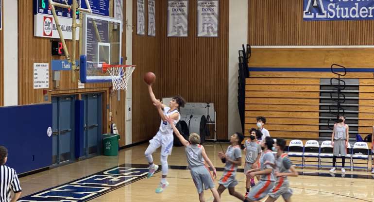 FROSH BOYS LOSE TO WASHINGTON HUSKIES 58-42 IN FIRST GAME IN 18 DAYS
