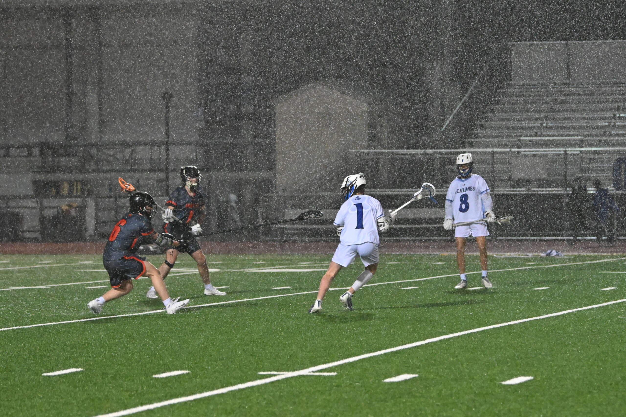 Varsity Boys Lacrosse Team Fall to Cal High 10-8  in a Friday Night Deluge