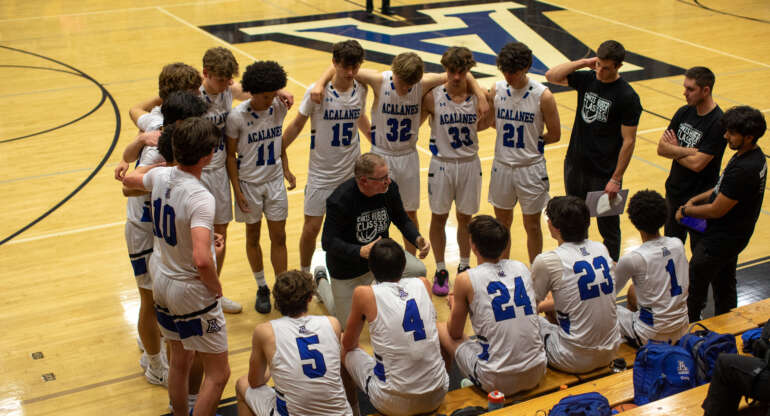 VARSITY BOYS HOOPS BATTLES WOODCREEK INTO OT BUT CAN’T PREVAIL, FINISHING SECOND AT HUBER CLASSIC