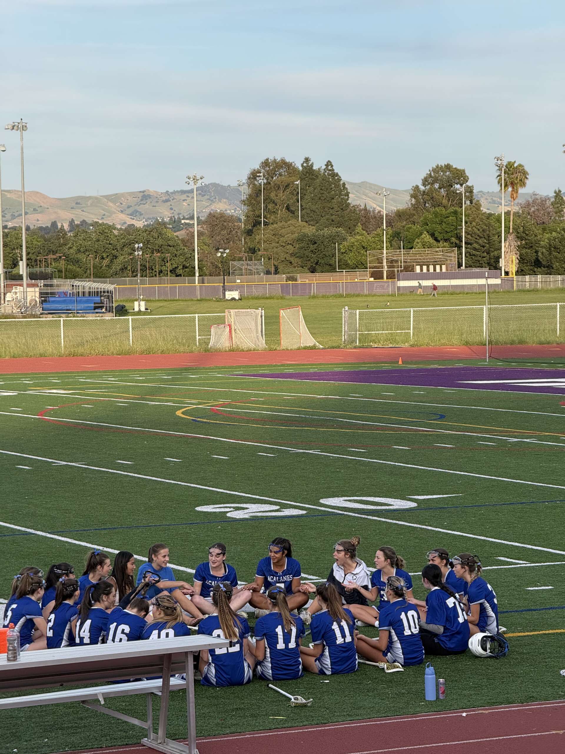 Varsity Girls Lacrosse Stays Cool After Delay, Pull Away to Beat College Park 10–8