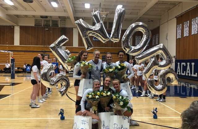 Dons Varsity Volleyball Takes Care of the Mats on Senior Night